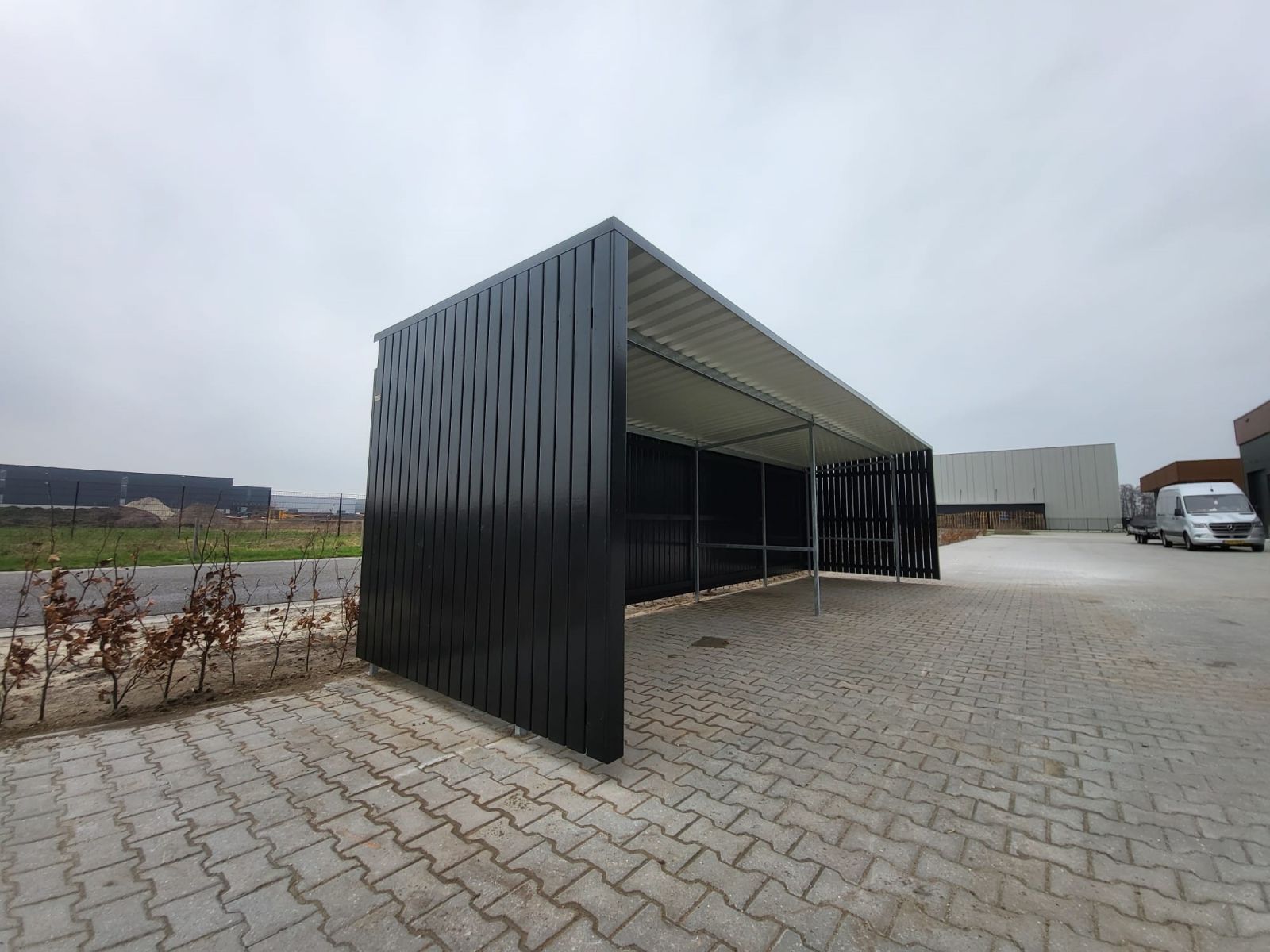 Fietsoverkapping in stijl bij warehouse Sans-online